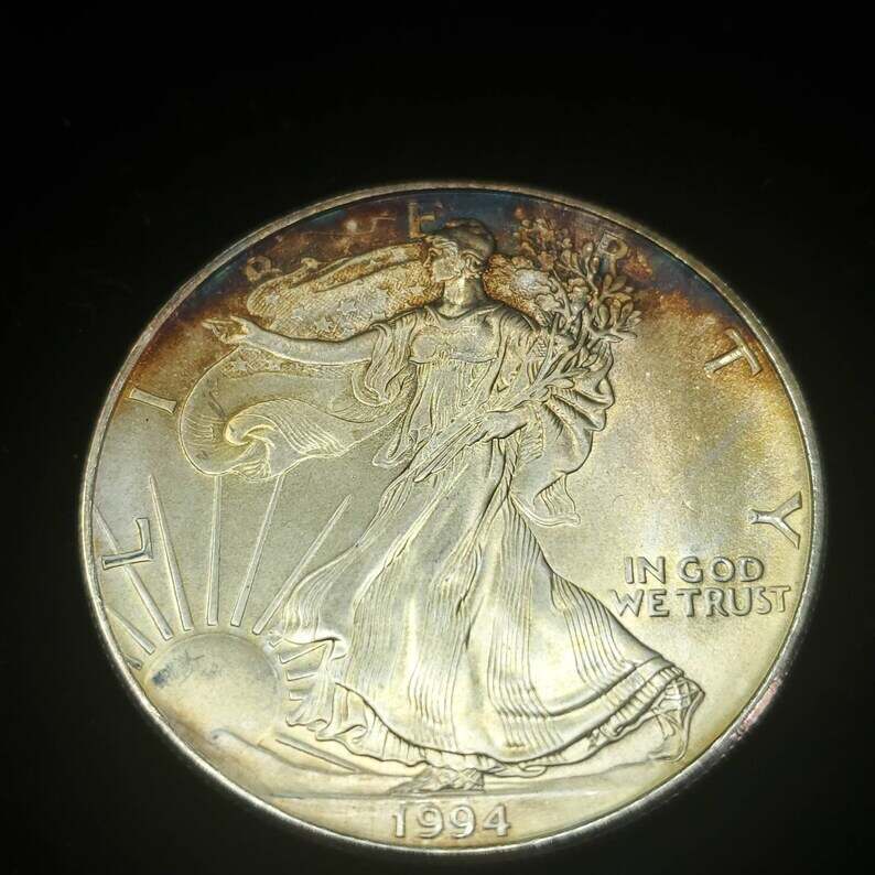 1994   American Silver Eagle  - Toned    -  1 Oz .999 Tough  Key date   Lot# 522 Regular 79