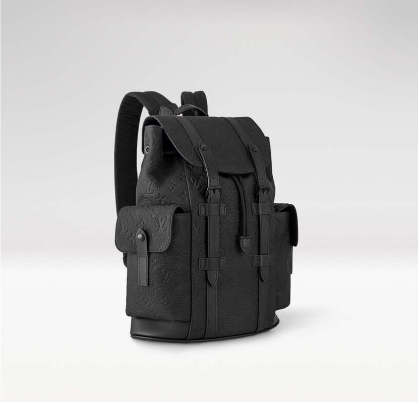 Heritage-Inspired Emblem-Print Leather Backpack – Compact Design with Side Pockets & Padded Tablet Compartment