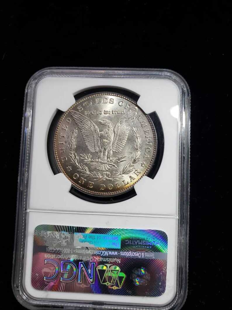 1885  Morgan Silver Dollar MS66 NGC   Graded - Beautiful color!! -    Lot# 1467.