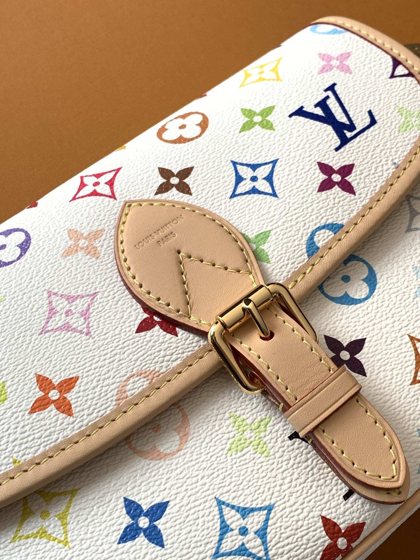 Louis Vuitton's classic Monogra This colorful Diane PM handbag with chips