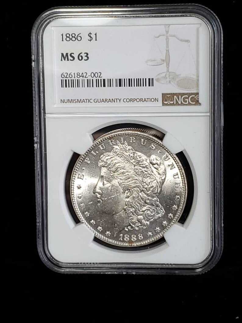1886  MS 63 Silver Morgan Dollar, NGC  MS 63  Silver  Coin . Blast White!   Lot # 1491