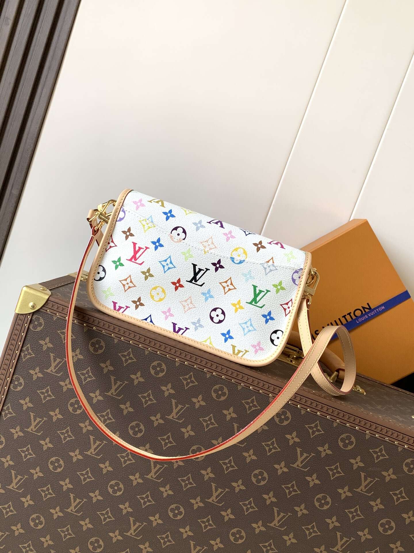 Louis Vuitton's classic Monogra This colorful Diane PM handbag with chips