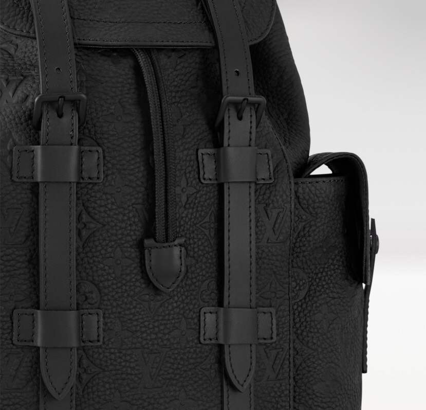 Heritage-Inspired Emblem-Print Leather Backpack – Compact Design with Side Pockets & Padded Tablet Compartment