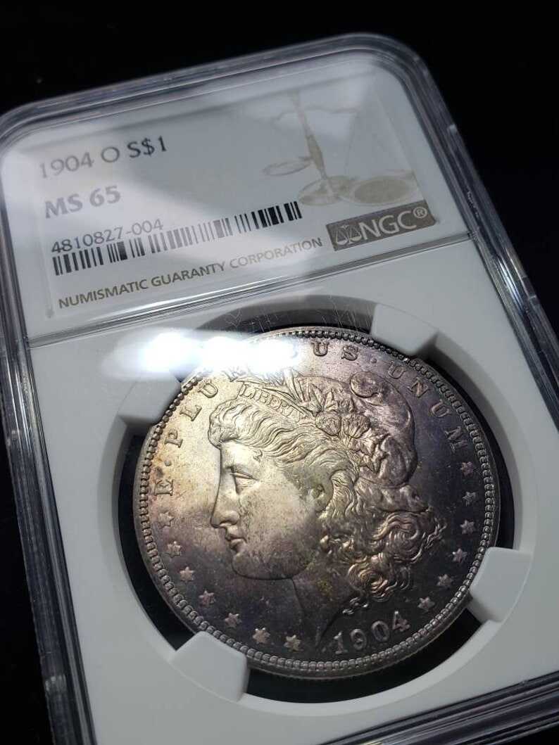 1904 O   Morgan Silver Dollar MS65  NGC   Graded - Beautiful color -Regular 440     Lot# 1466