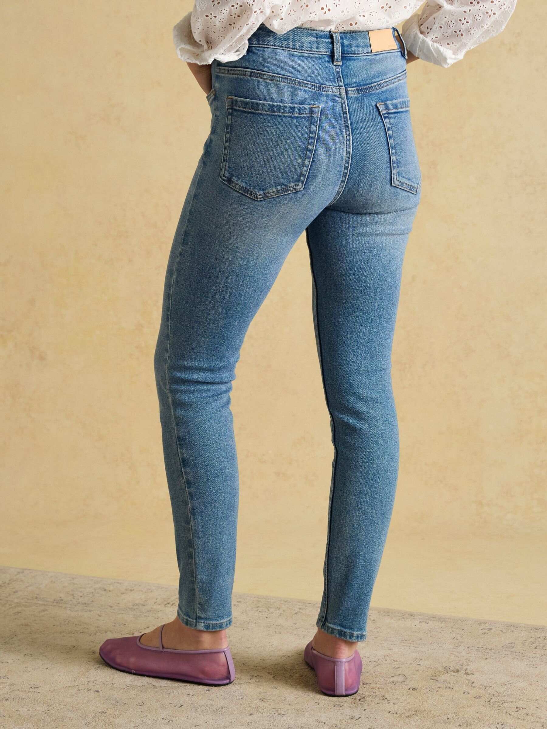 White Skinny Fit Mid Rise Jeans