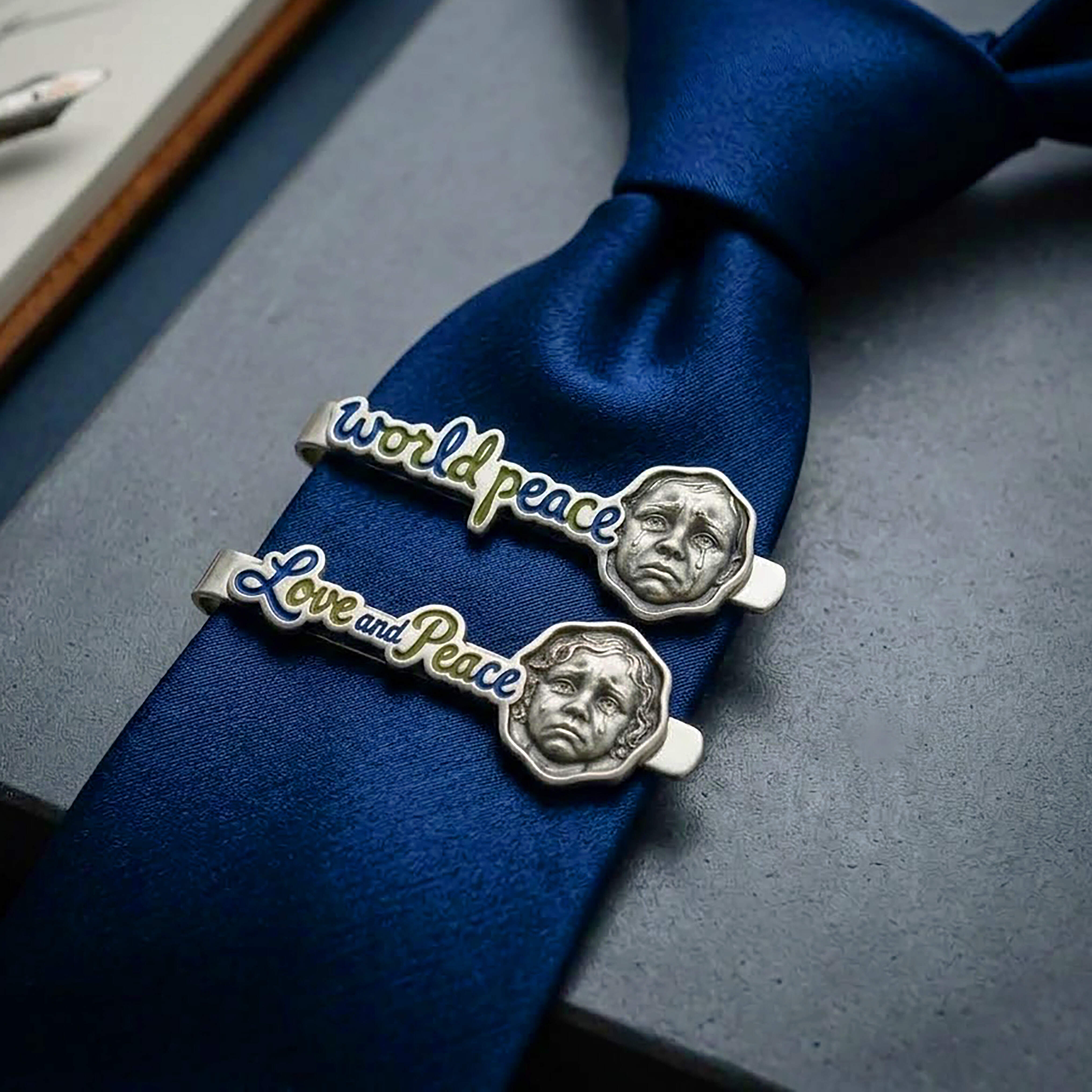 Anti-war theme tie clip
