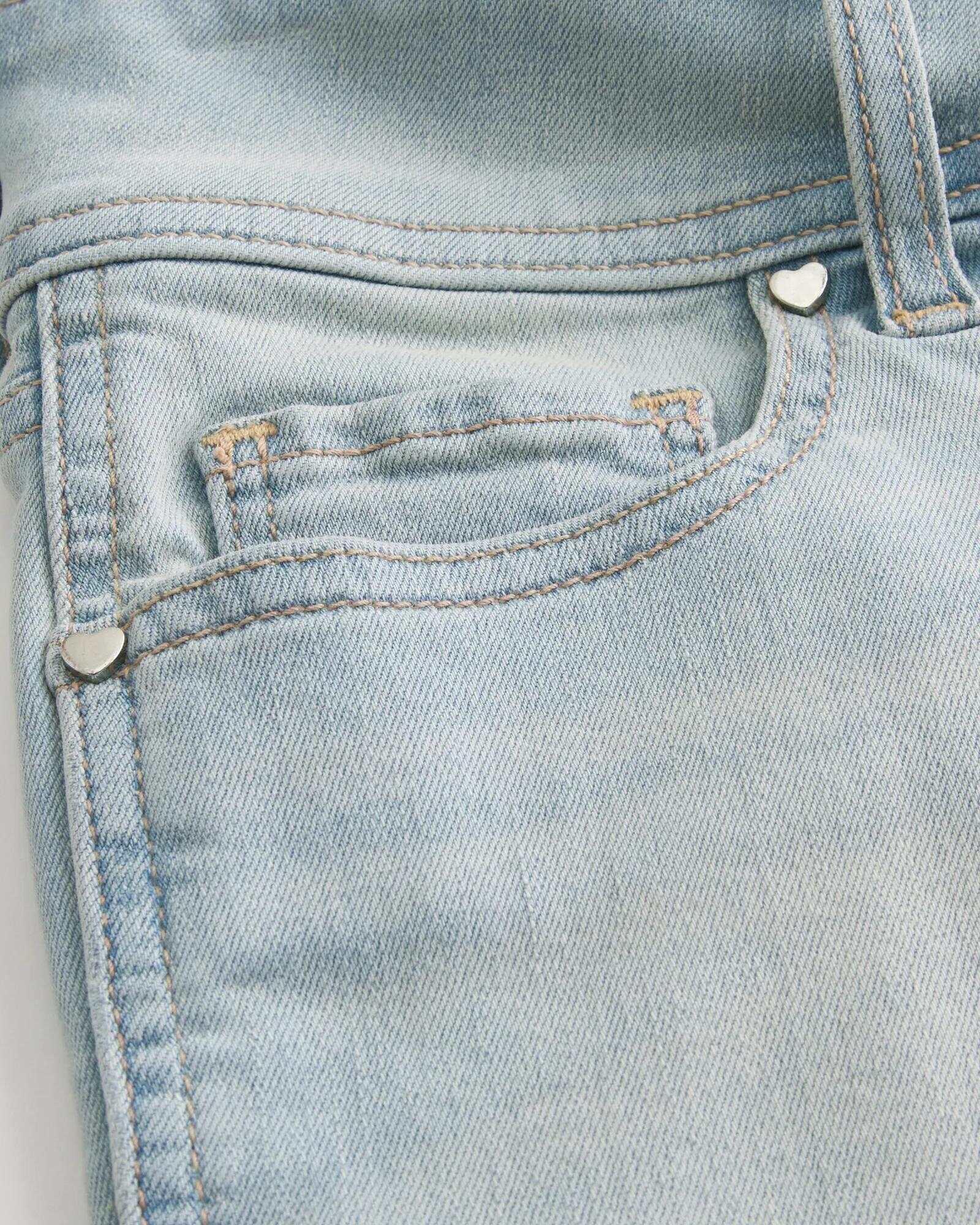 Low-Rise Medium Wash Denim Shortie Shorts