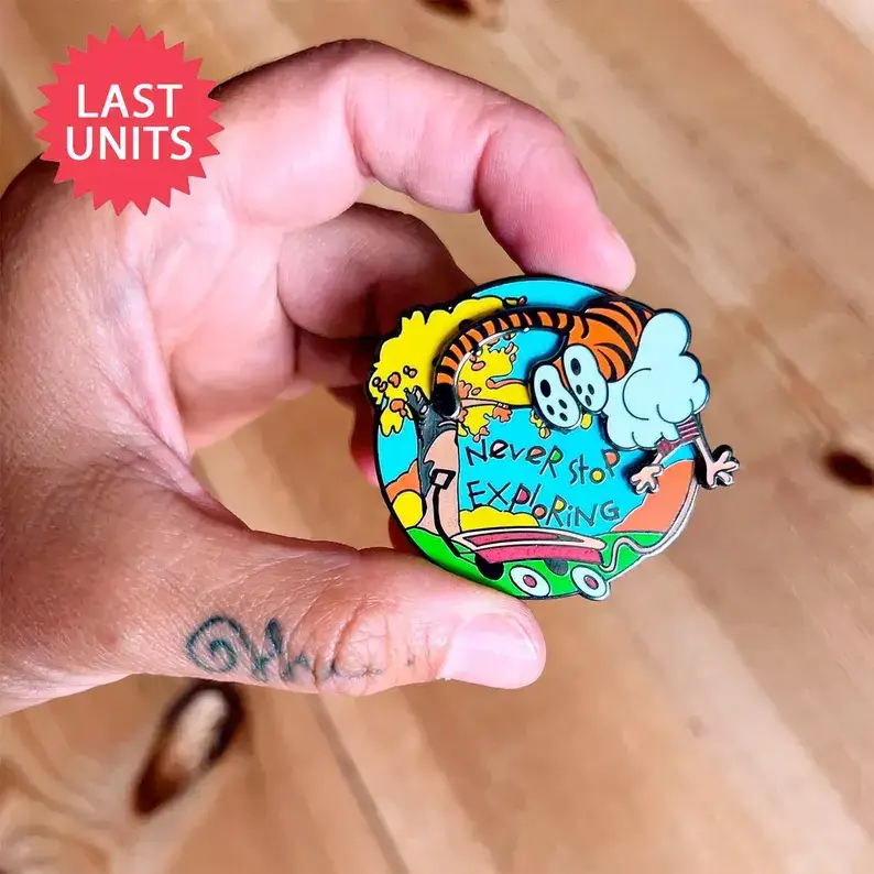 Calvin & Hobbes “Never Stop Exploring” Spinning Pin