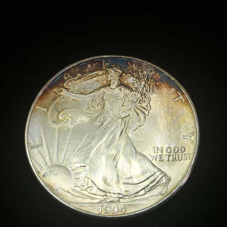 1994   American Silver Eagle  - Toned    -  1 Oz .999 Tough  Key date   Lot# 522 Regular 79
