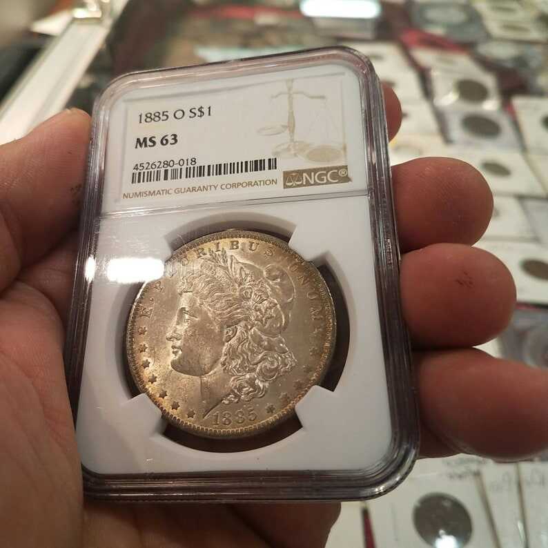 1885 O Morgan Silver Dollar, Nicely  Toned. NGC MS63 lot#226.