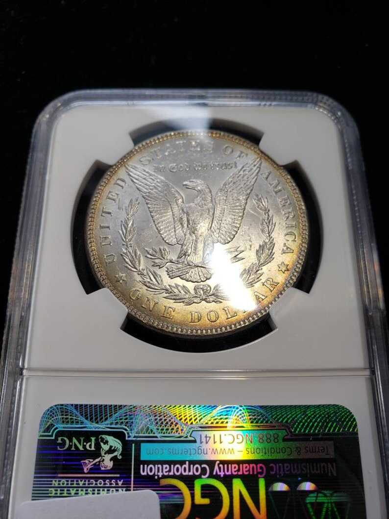 1888 Morgan Silver Dollar MS63 NGC Graded with Nice Toning Color Toned Coin along the rims.     Lot# 1463