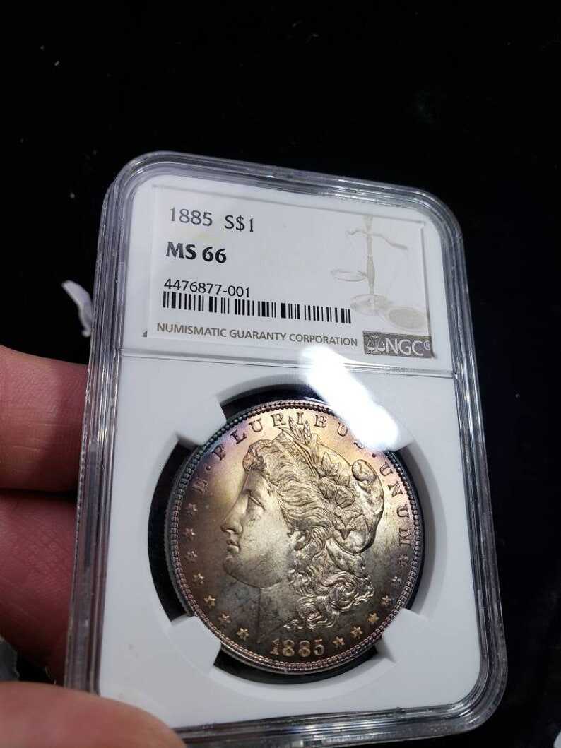 1885  Morgan Silver Dollar MS66 NGC   Graded - Beautiful color!! -    Lot# 1467.