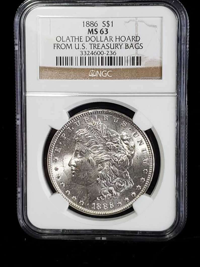 1886  MS 63 Silver Morgan Dollar, NGC  MS 63  Silver  Coin . Olathe Dollar Hoard - From the U.S Treasury Bags !    Lot # 1494