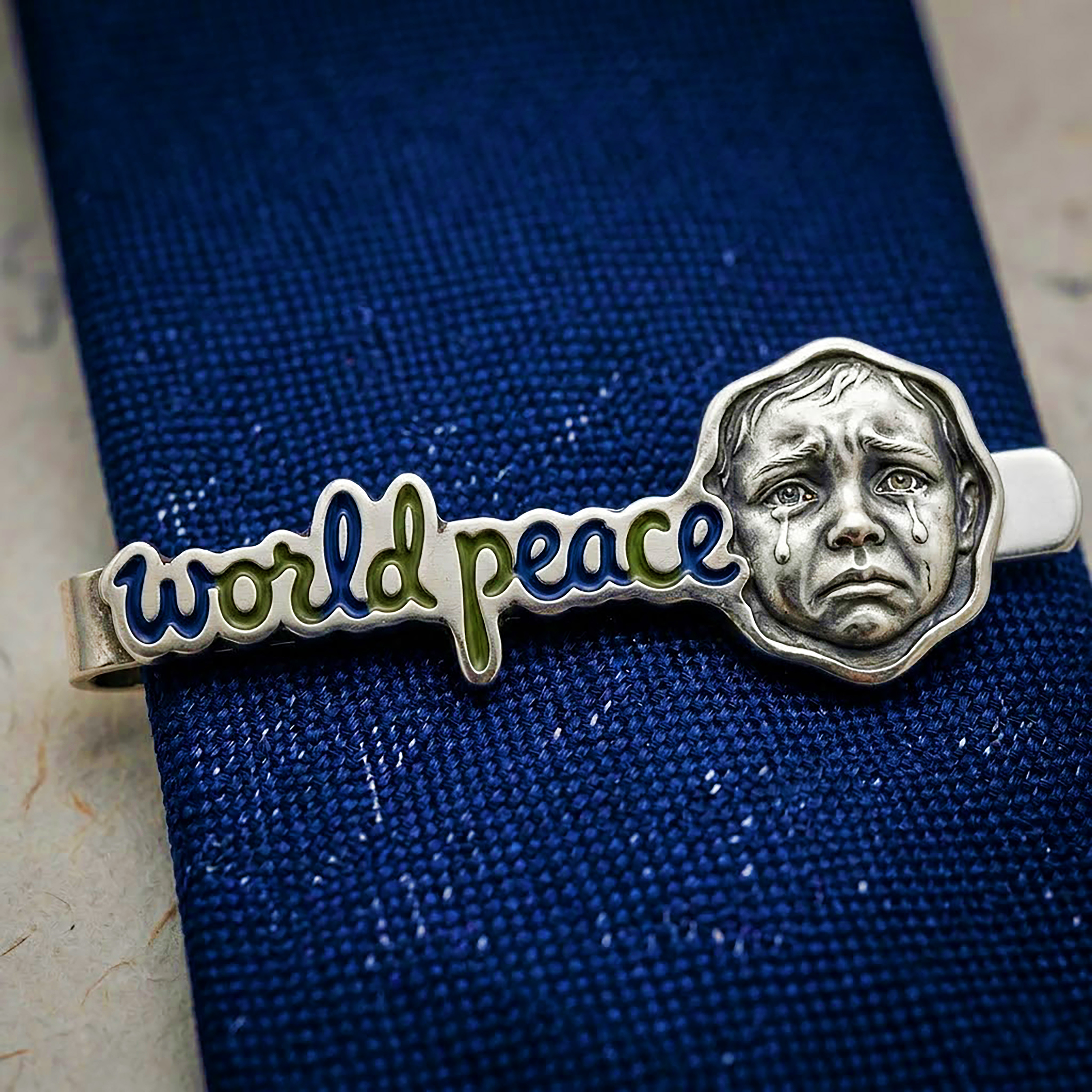 Anti-war theme tie clip