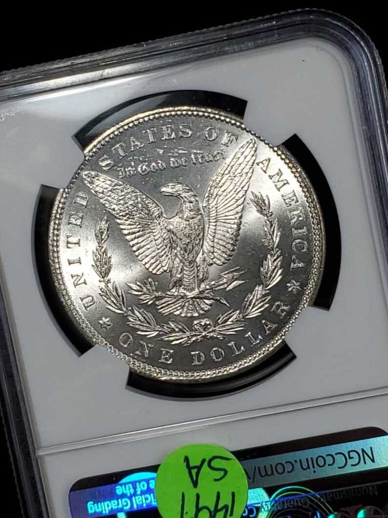 1886  MS 63 Silver Morgan Dollar, NGC  MS 63  Silver  Coin . Blast White!   Lot # 1491