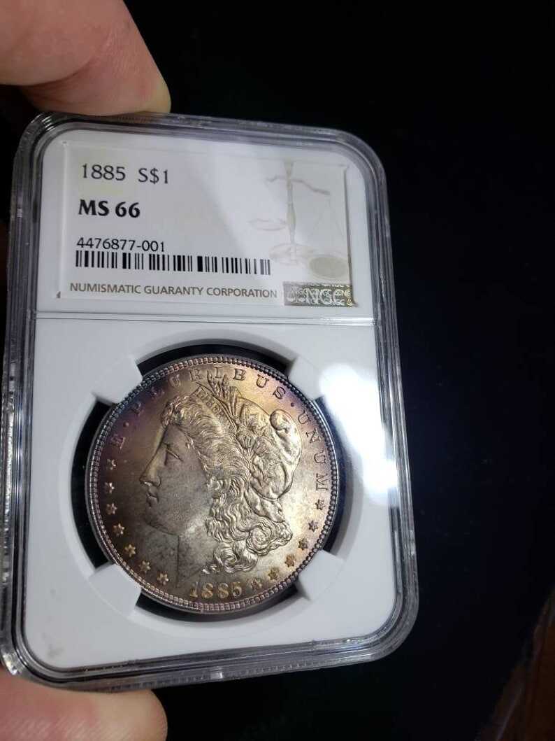 1885  Morgan Silver Dollar MS66 NGC   Graded - Beautiful color!! -    Lot# 1467.