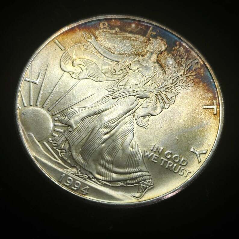 1994   American Silver Eagle  - Toned    -  1 Oz .999 Tough  Key date   Lot# 522 Regular 79