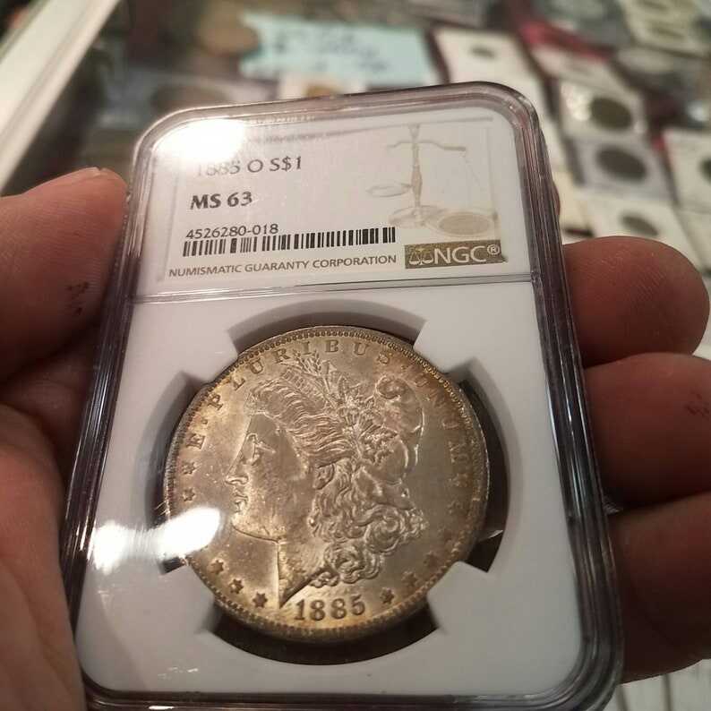 1885 O Morgan Silver Dollar, Nicely  Toned. NGC MS63 lot#226.