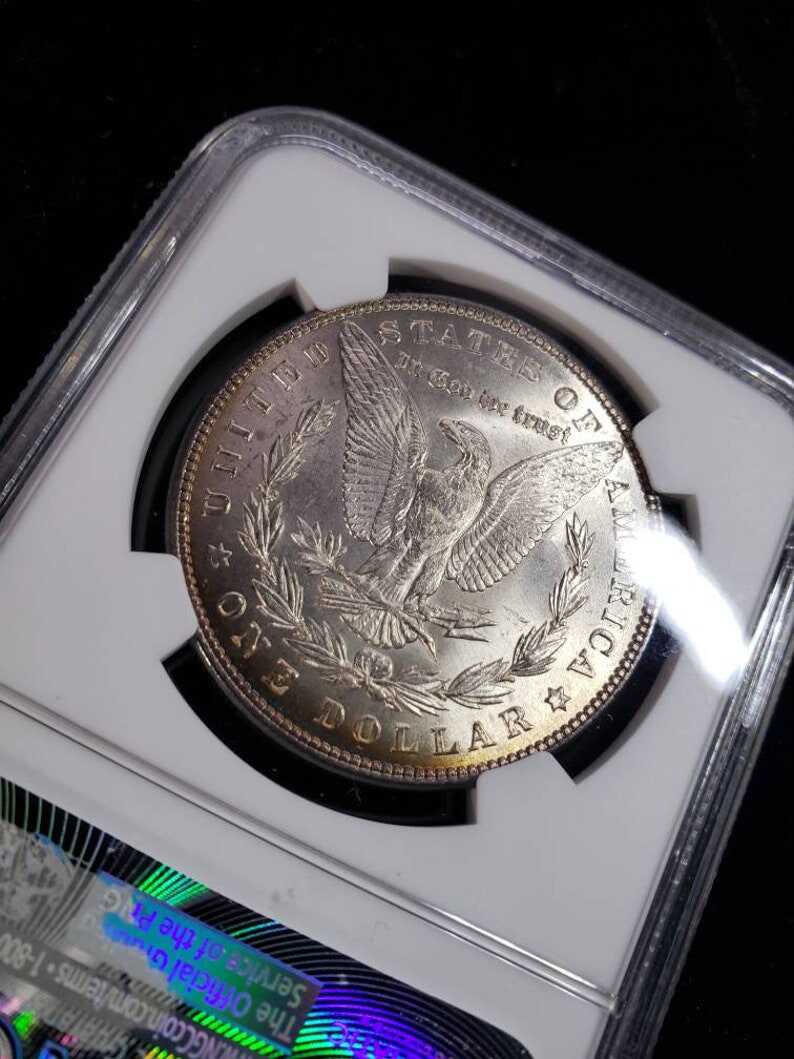 1885  Morgan Silver Dollar MS66 NGC   Graded - Beautiful color!! -    Lot# 1467.
