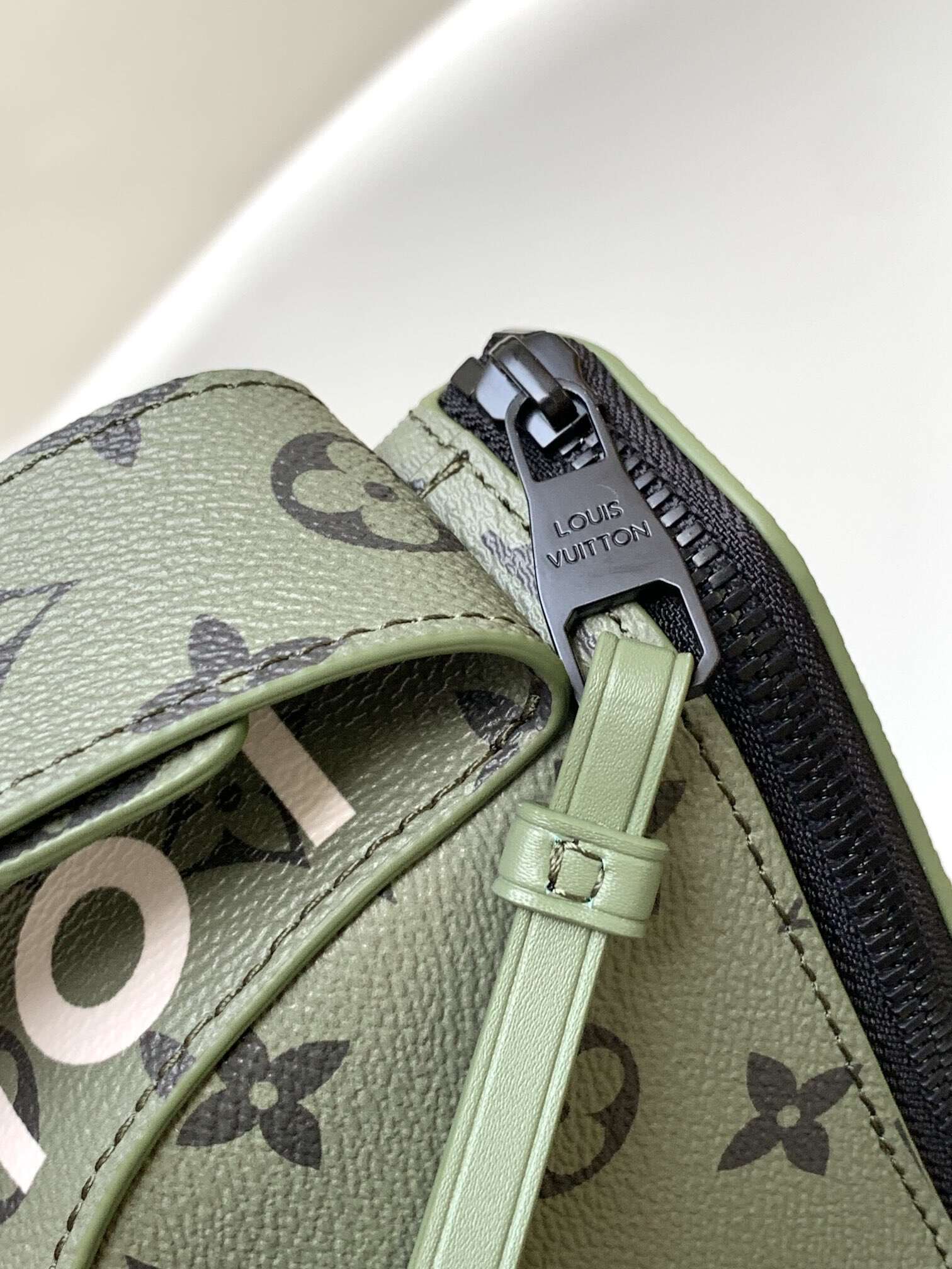 Emblem-Print Crescent Crossbody Bag | Coated Canvas with Contrast Lining & Adjustable Strap