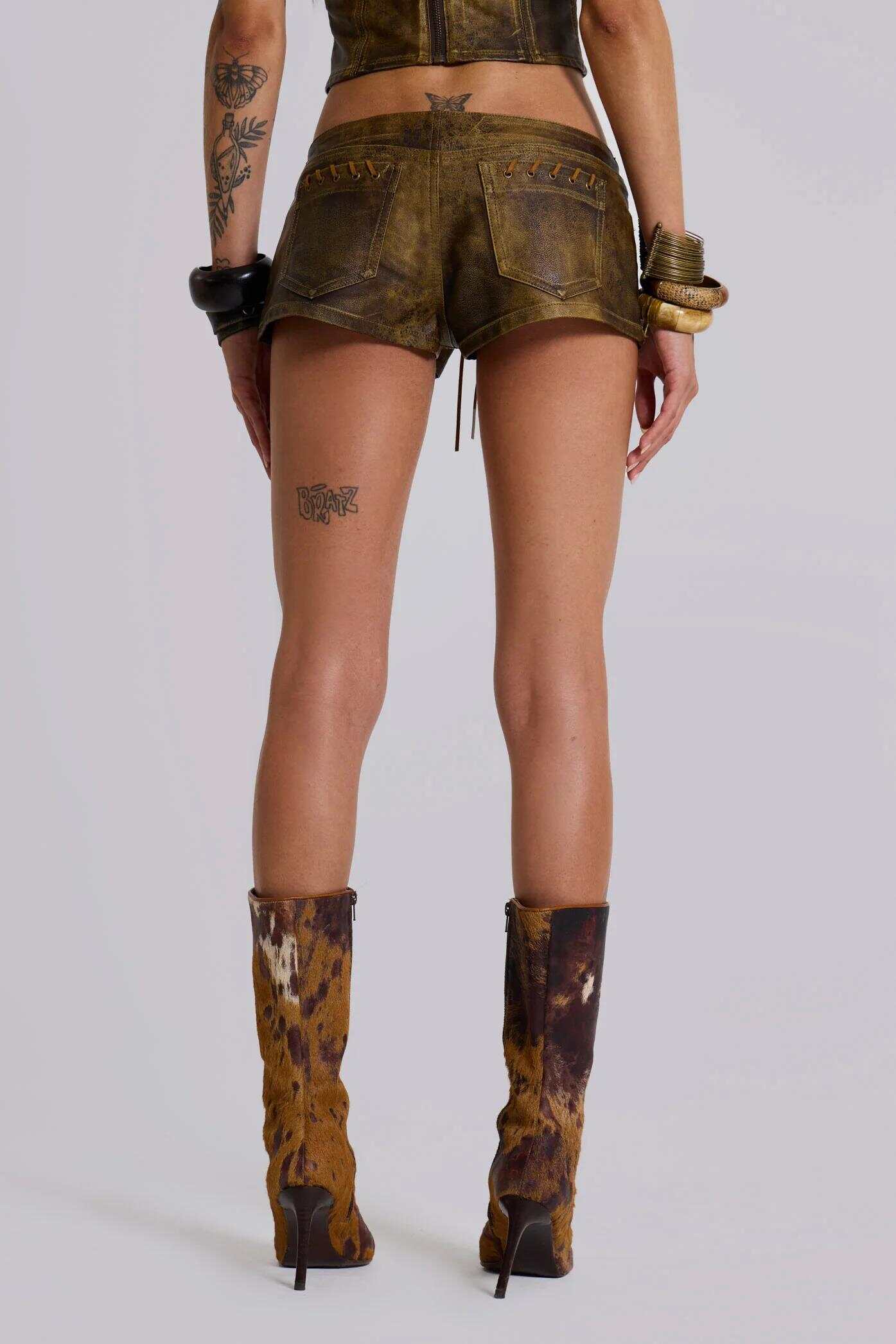 Vaca Whipstitch Faux Leather Mini Shorts in Brown