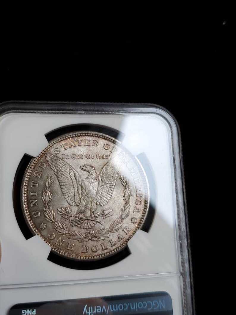 1881  MS 63 Silver Morgan Dollar, NGC  MS 63  Silver  Coin . Beautiful Toning ! Key date!   Lot # 1479