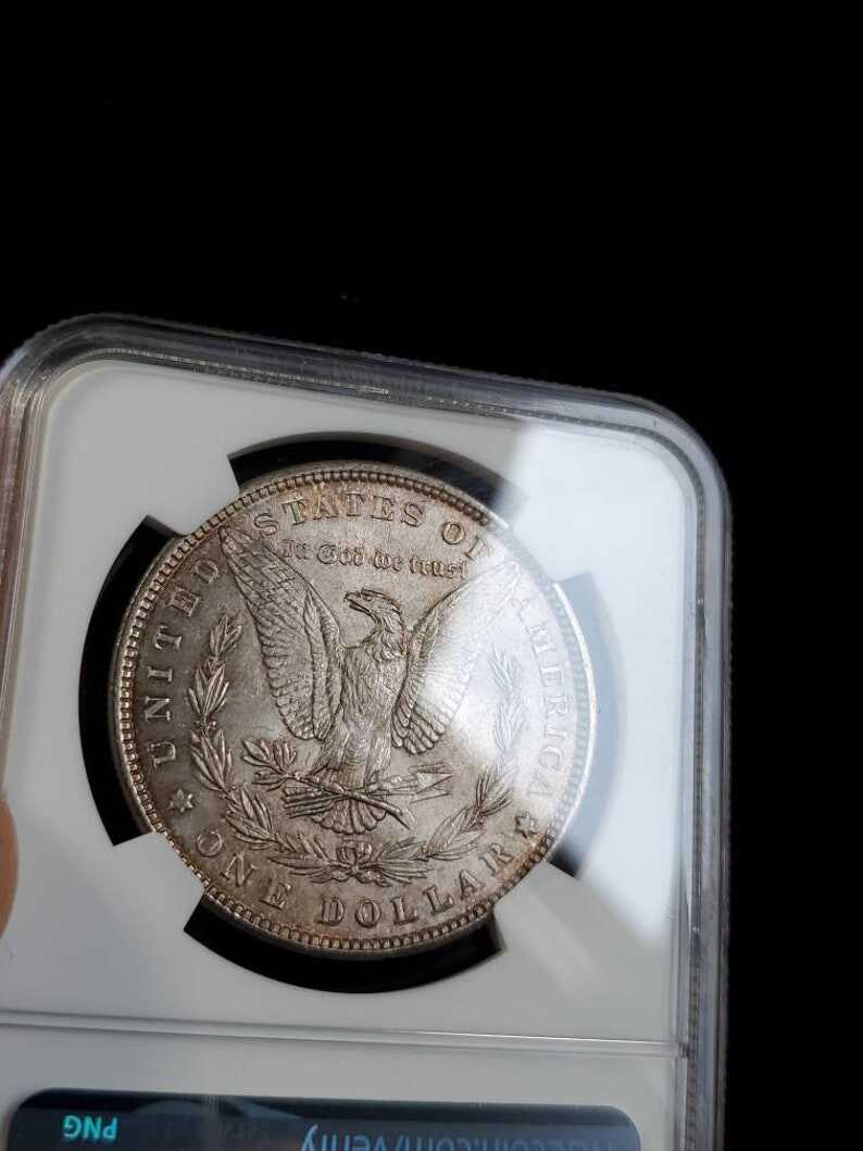 1881  MS 63 Silver Morgan Dollar, NGC  MS 63  Silver  Coin . Beautiful Toning ! Key date!   Lot # 1479