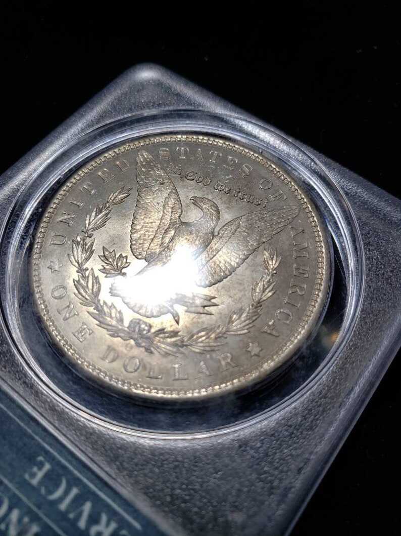 1904 O  Morgan Silver Dollar PCGS MS62, Old Green Rattler.   Lot # 1490 Regular 115