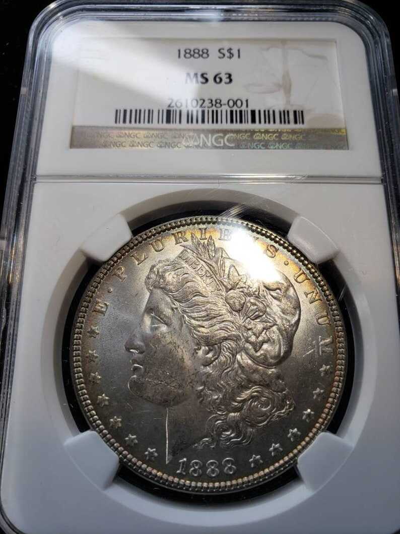 1888 Morgan Silver Dollar MS63 NGC Graded with Nice Toning Color Toned Coin along the rims.     Lot# 1463