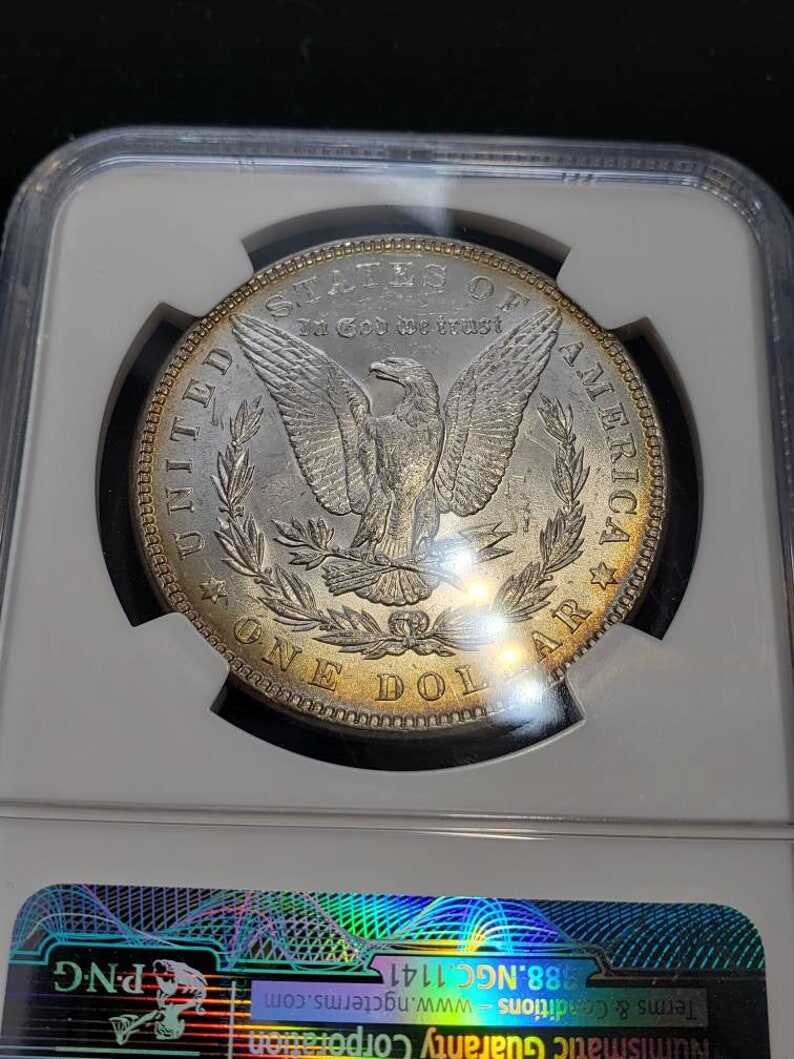 1888 Morgan Silver Dollar MS63 NGC Graded with Nice Toning Color Toned Coin along the rims.     Lot# 1463