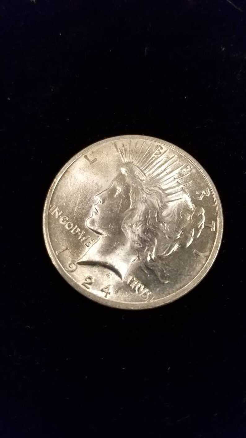 1924  Silver Peace Dollar BU   ! Lot# 773 Reg 69