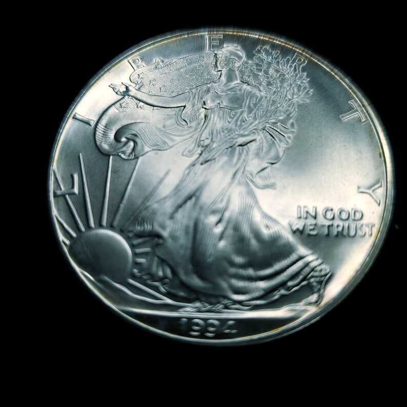 1994   American Silver Eagle  - Slightly  Toned    -  1 Oz .999 Tough  Key date   Lot# 84  Regular 89
