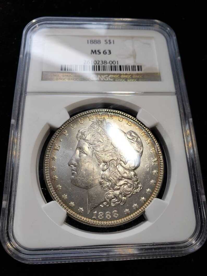 1888 Morgan Silver Dollar MS63 NGC Graded with Nice Toning Color Toned Coin along the rims.     Lot# 1463