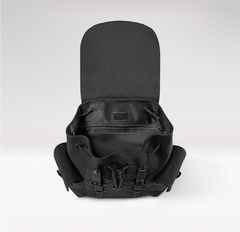 Heritage-Inspired Emblem-Print Leather Backpack – Compact Design with Side Pockets & Padded Tablet Compartment
