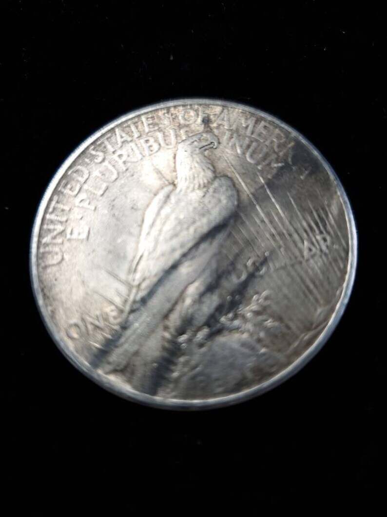 1925  Silver Peace Dollar AU - tarnish on obverse/reverse   Lot# 129