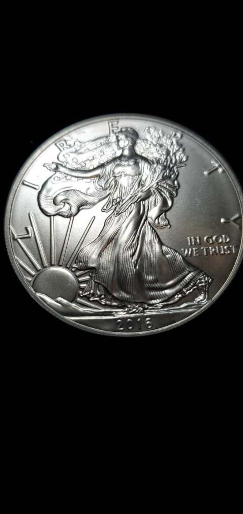 2016  American Silver Eagle BU  -  1 Oz .999 Silver- includes airtight plastic capsule    Lot#  360