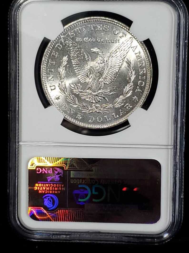 1886  MS 63 Silver Morgan Dollar, NGC  MS 63  Silver  Coin . Olathe Dollar Hoard - From the U.S Treasury Bags !    Lot # 1494