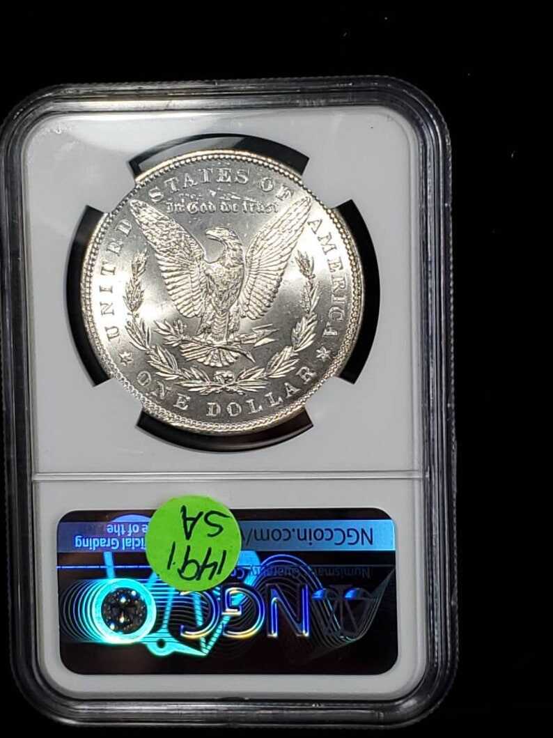 1886  MS 63 Silver Morgan Dollar, NGC  MS 63  Silver  Coin . Blast White!   Lot # 1491