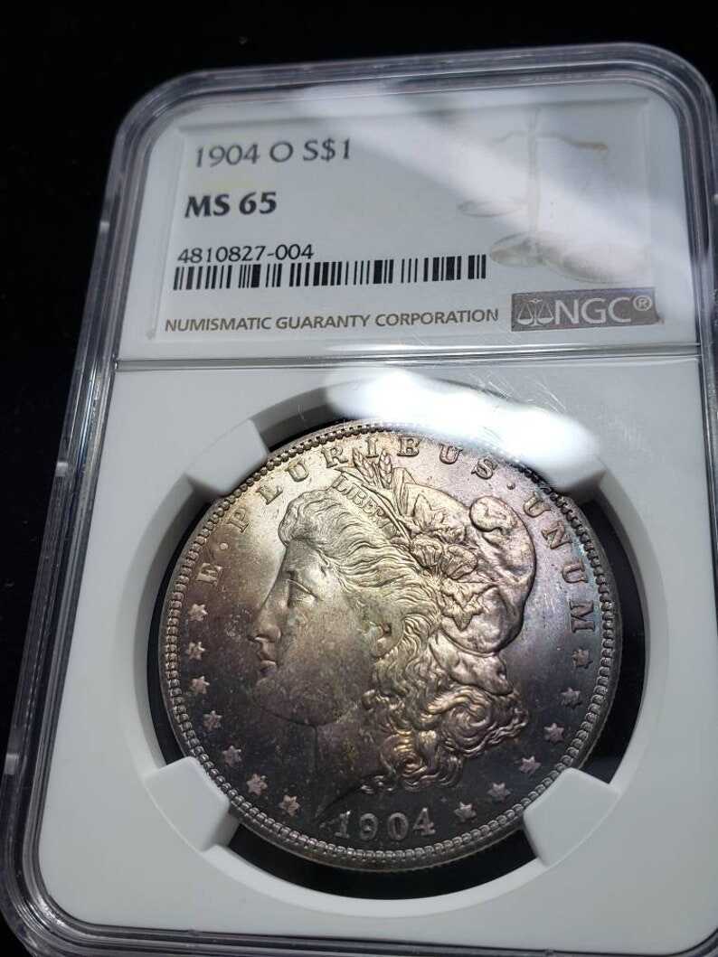 1904 O   Morgan Silver Dollar MS65  NGC   Graded - Beautiful color -Regular 440     Lot# 1466