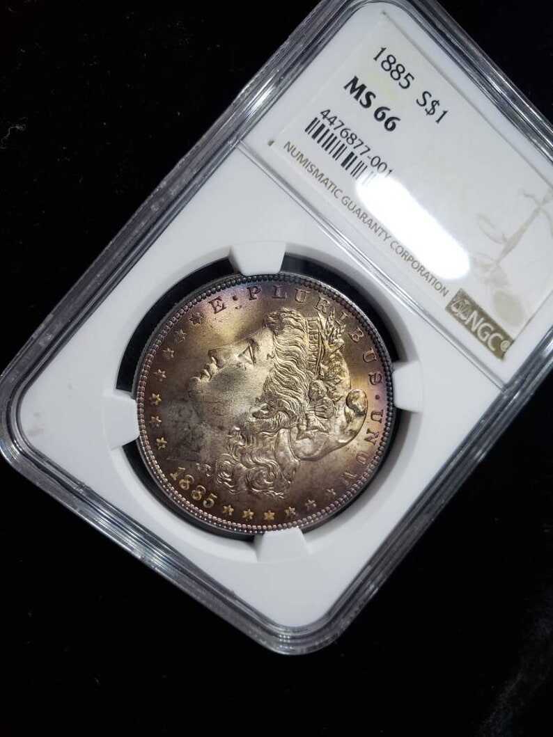 1885  Morgan Silver Dollar MS66 NGC   Graded - Beautiful color!! -    Lot# 1467.