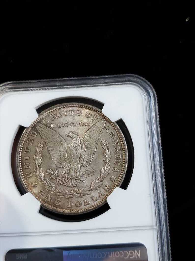 1881  MS 63 Silver Morgan Dollar, NGC  MS 63  Silver  Coin . Beautiful Toning ! Key date!   Lot # 1479
