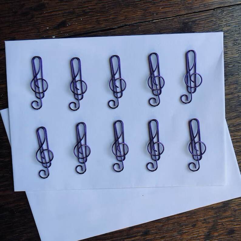 A set of 10 high quality music treble clef colored metal paper clips