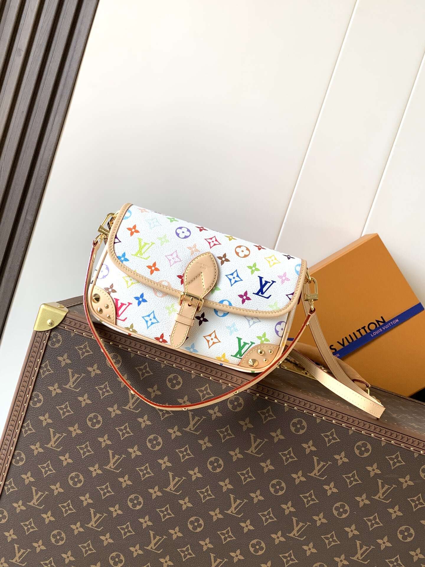 Louis Vuitton's classic Monogra This colorful Diane PM handbag with chips