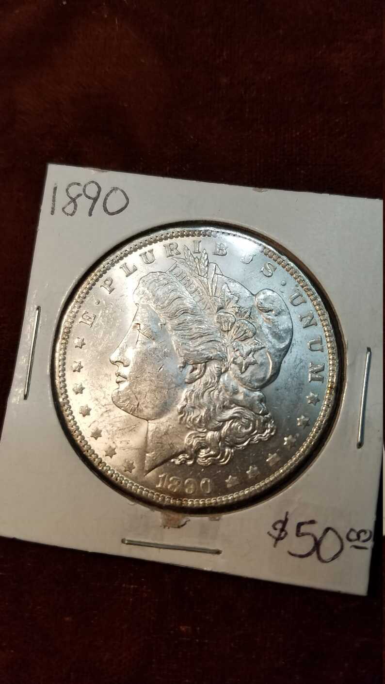 1890 BU Morgan Silver Dollar COIN -  - Lot# 560 Regular 85