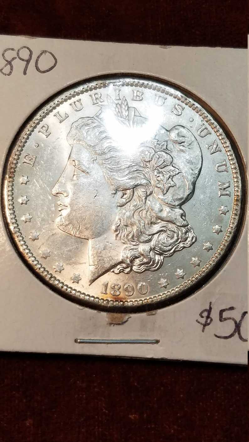 1890 BU Morgan Silver Dollar COIN -  - Lot# 560 Regular 85
